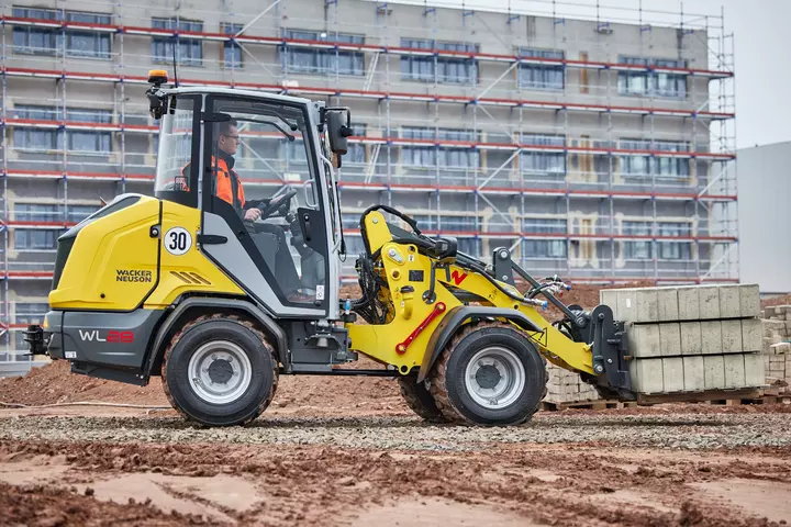 Wacker Neuson wheel loader moving construction materials